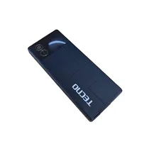 Gros plan sur la partie arrière du téléphone Tecno T315, mettant en évidence le module de l'appareil photo, les haut-parleurs et le logo Tecno