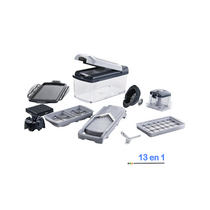 Mandoline Genius Nicer Dicer Fusion posée sur un plan de travail avec légumes découpés