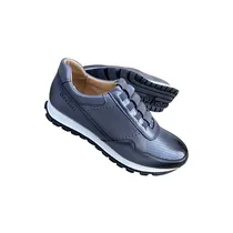 Patine-Main-Cuir-Venezia-Chaussure-Berluti-Lacet-Signature