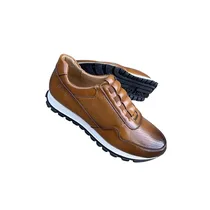 Gros-Plan-Semelle-Gomme-Tennis-Berluti-Adhérence-Confort