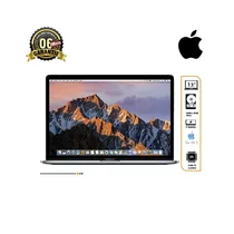 MacBook Pro 2017 13 pouces argent/bleu ouvert sur bureau moderne