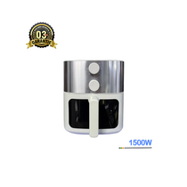 Friteuse à air Oscar OSC-716W posée sur un plan de travail avec légumes cuits