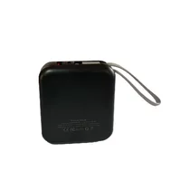 Vue de l'arrière du Power Bank 120W 10000mAh ultra-rapide noir avec écran LED 100% et câbles de charge intégrés