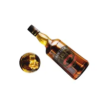 Whisky CHANCELER servi dans un verre sur glace