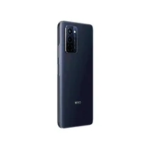 Wiko 10 posé sur une table avec accessoires modernes