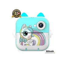 Appareil photo instantané Unicorn pour enfants, de couleur bleu et blanc. Batterie 800mAh. Garantie 3 mois