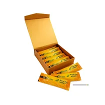 Boîte dorée de sachets de Café aphrodisiaque Bio Herbs Royal King Honey, montrant l'emballage individuel des sticks