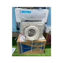 Vue du carton d'emballage du climatiseur split NEXON 12000BTU 1.5CV ainsi que sa surface intérieur et extérieur