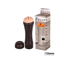 Masturbateur masculin Bussy Vibrations, couleur noire et chair, avec son capuchon et son emballage, mettant en évidence ses 7 vitesses