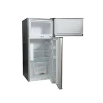 Intérieur du réfrigérateur ROCH 100L RFR-125DT-W montrant les clayettes en verre et le bac à légumes transparent