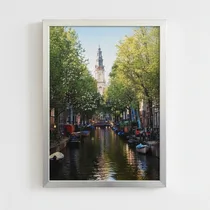 Tableau sur toile représentant les canaux d'Amsterdam au coucher du soleil pour salon moderne.