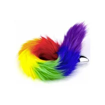 Plug anal avec base évasée posé sur une surface blanche