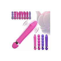 Gode silicone rose connecté à un câble USB pour recharge