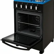 Intérieur du four à gaz Glamstar avec grille de cuisson et vitre de protection.