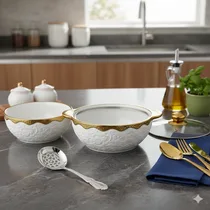 Soupière porcelaine ouverte montrant l'intérieur en inox et le couvercle en verre.