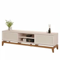 Meuble TV design bohémien dans un salon moderne avec décoration épurée.