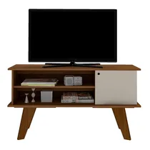 Meuble TV bicolore installé dans un salon avec une décoration minimaliste.