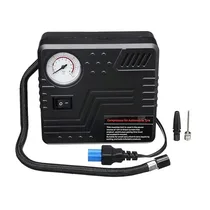 Compresseur d'air noir 12V avec manomètre de pression intégré.