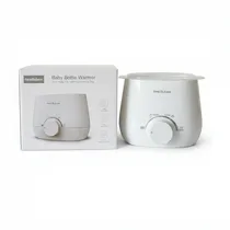 Chauffe-biberon blanc moderne et sa boîte d'emballage sur fond blanc.