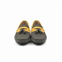 Paire de mocassins Polo Club bicolores présentés sur fond blanc.