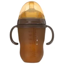 Grignoteuse et cuillère en silicone souple pour diversification alimentaire.