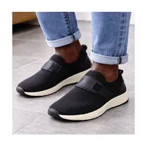 Chaussure homme noire slip-on avec semelle épaisse beige