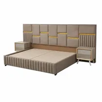 Tête de lit capitonnée avec motifs géométriques dorés