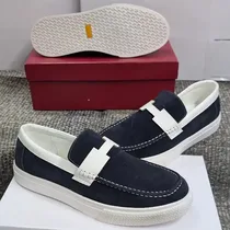 Mocassins Hermès homme daim bleu et blanc vue de profil