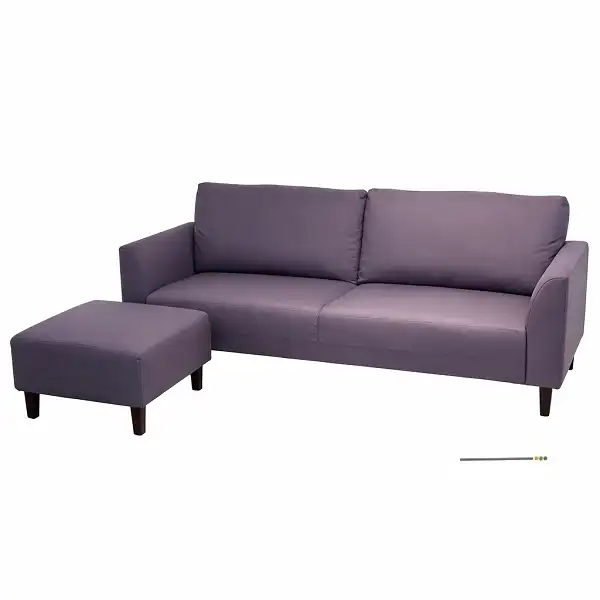 Canapé d’angle Milla violet avec pouf dans un salon moderne