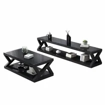 Table basse design géométrique noire brillante avec double plateau