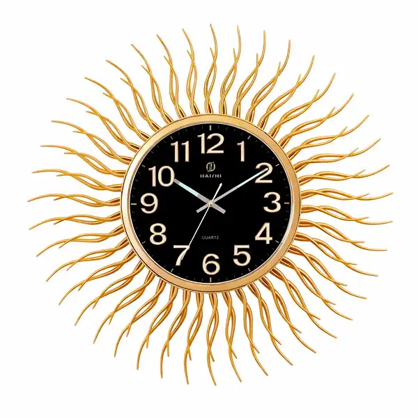 Horloge murale soleil design moderne noir et or