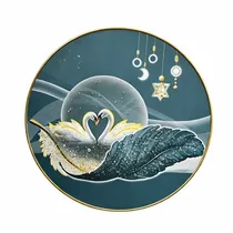 Tableau décoratif rond en verre trempé avec motif cygnes dorés