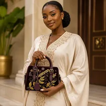 Sac à main femme bordeaux luxe avec motifs dorés