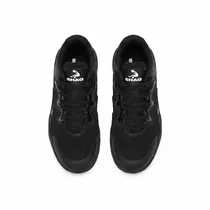 Détail de la semelle extérieure antidérapante de la basket SHAQ noire.