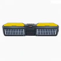 Enceinte Bluetooth MeWe noire et jaune avec radio FM et lecteur USB.